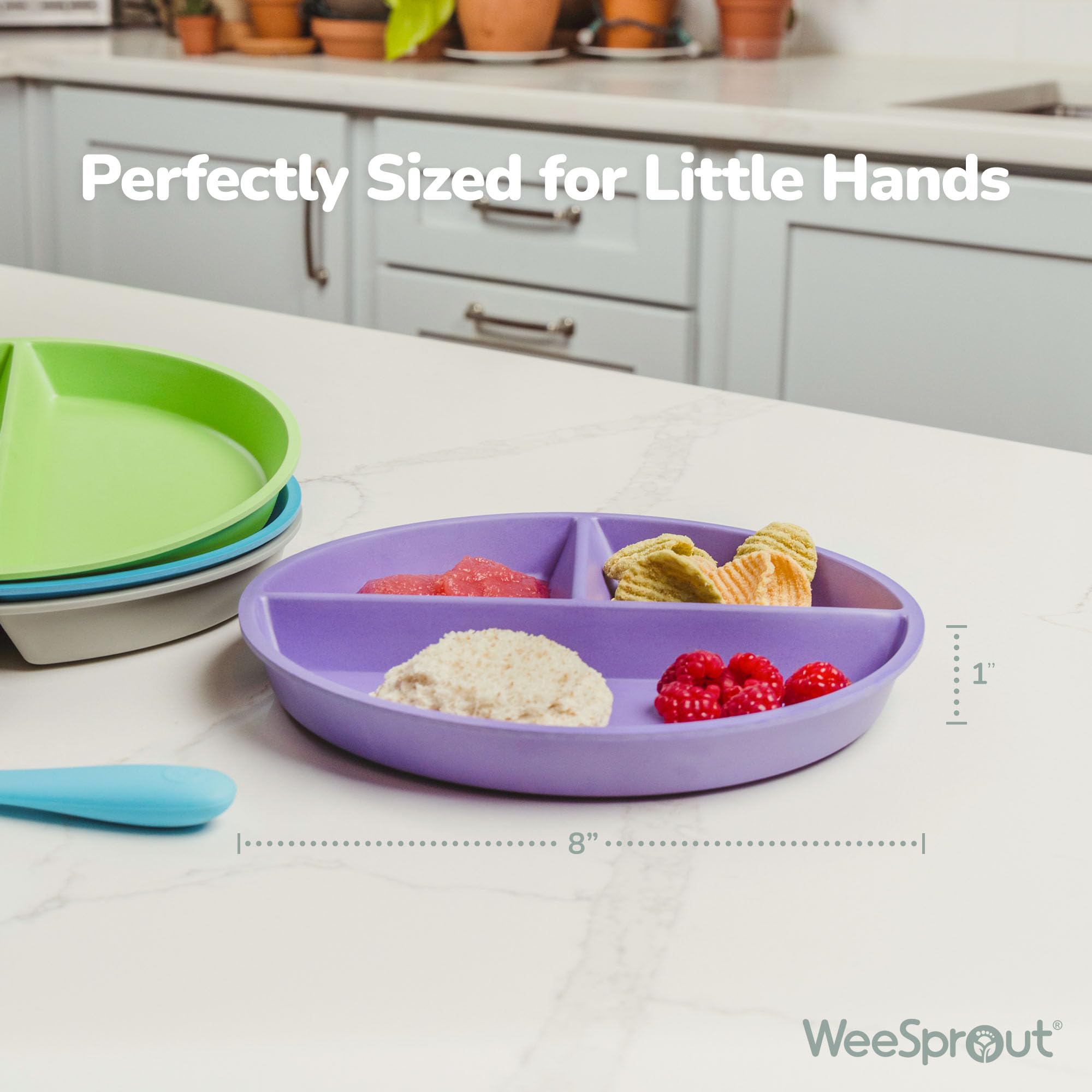 WeeSprout divided plate with raised edges minimizes spills during self-feeding.
