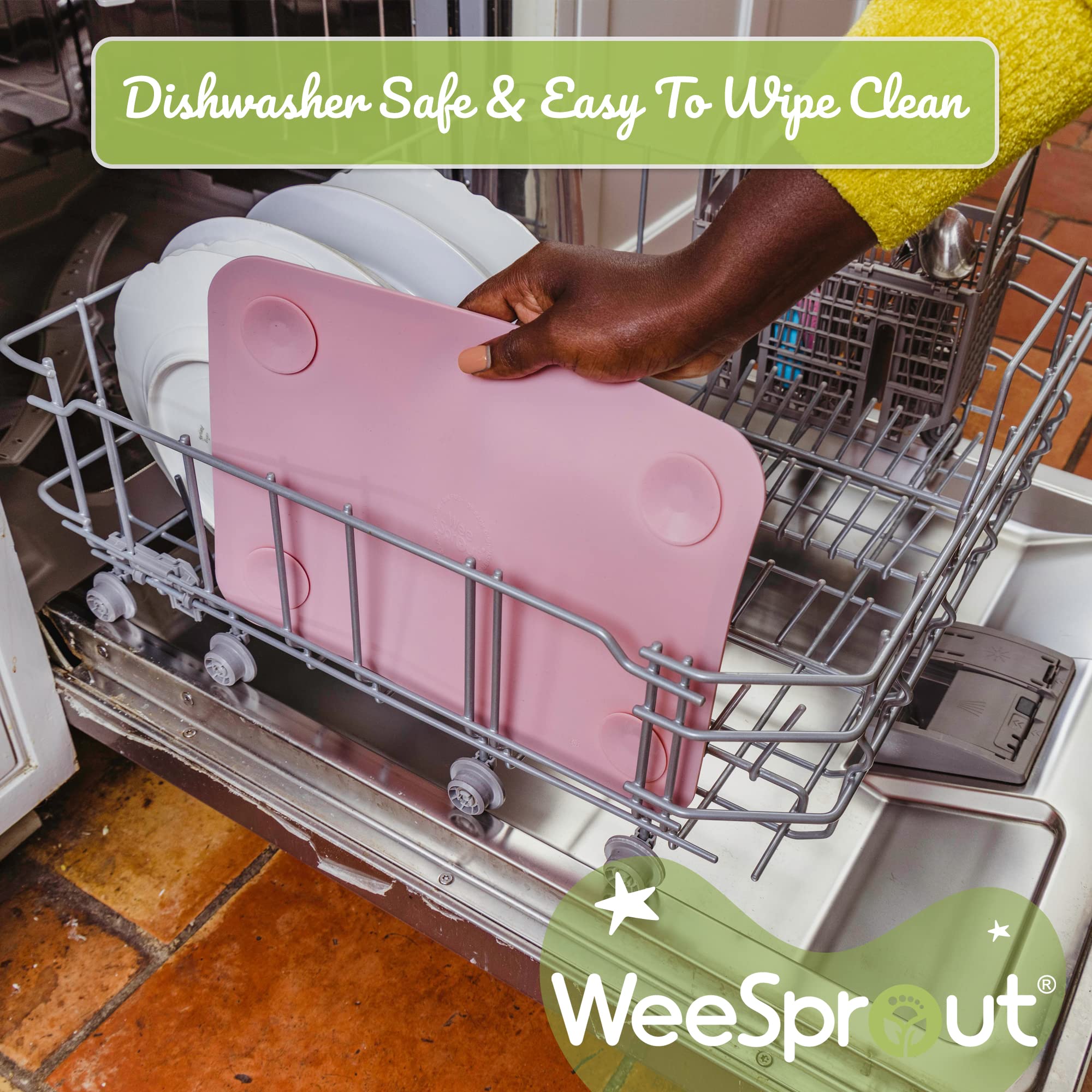 WeeSprout placemats being cleaned easily after use with boil-proof design