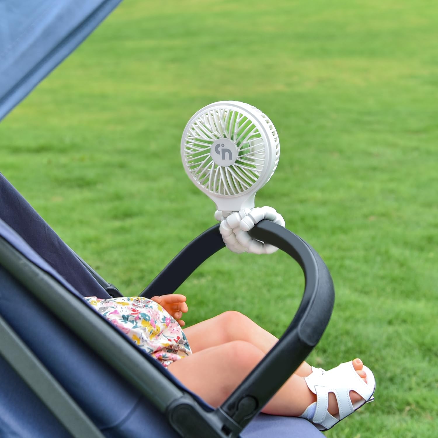 WEGA compact fan ideal for stroller, crib, car seat, or travel.