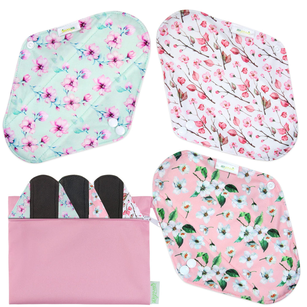 Wegreeco Charcoal Reusable Pads with cherry blossoms print for comfortable daily protection.