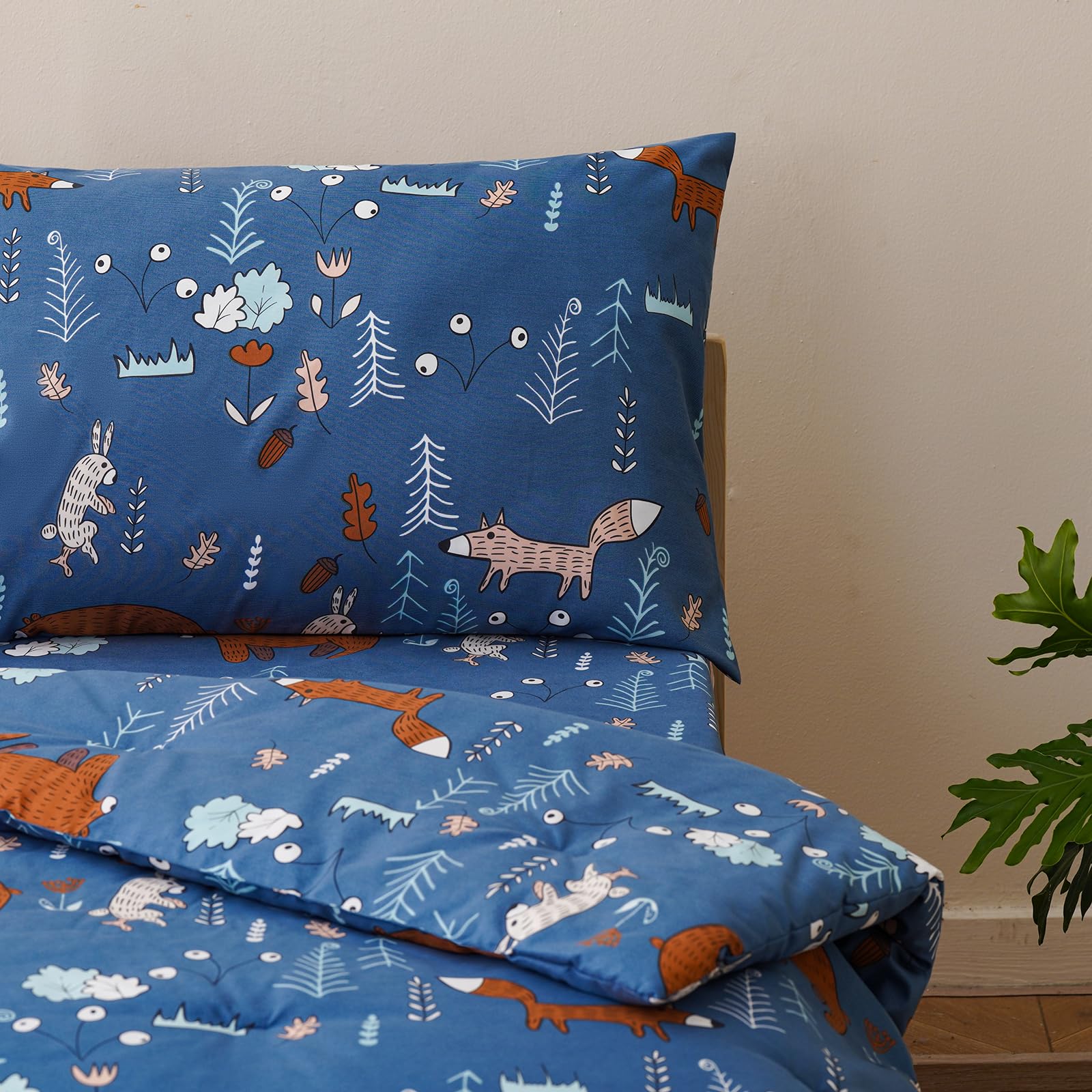 Wellboo Blue Bear pillow close-up highlighting soft fill and supportive shape for restful naps.