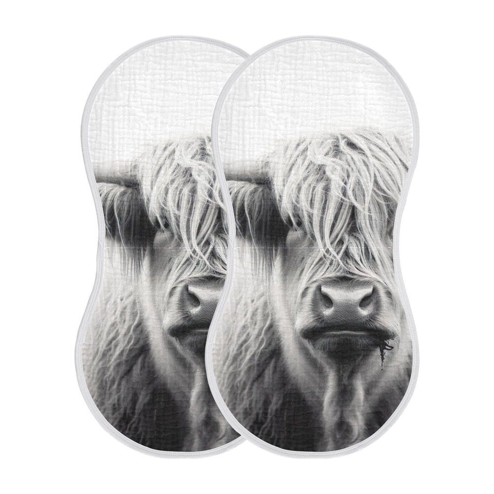 Wellday Highland Cow design muslin burp cloth with soft, absorbent cotton for gentle baby care.