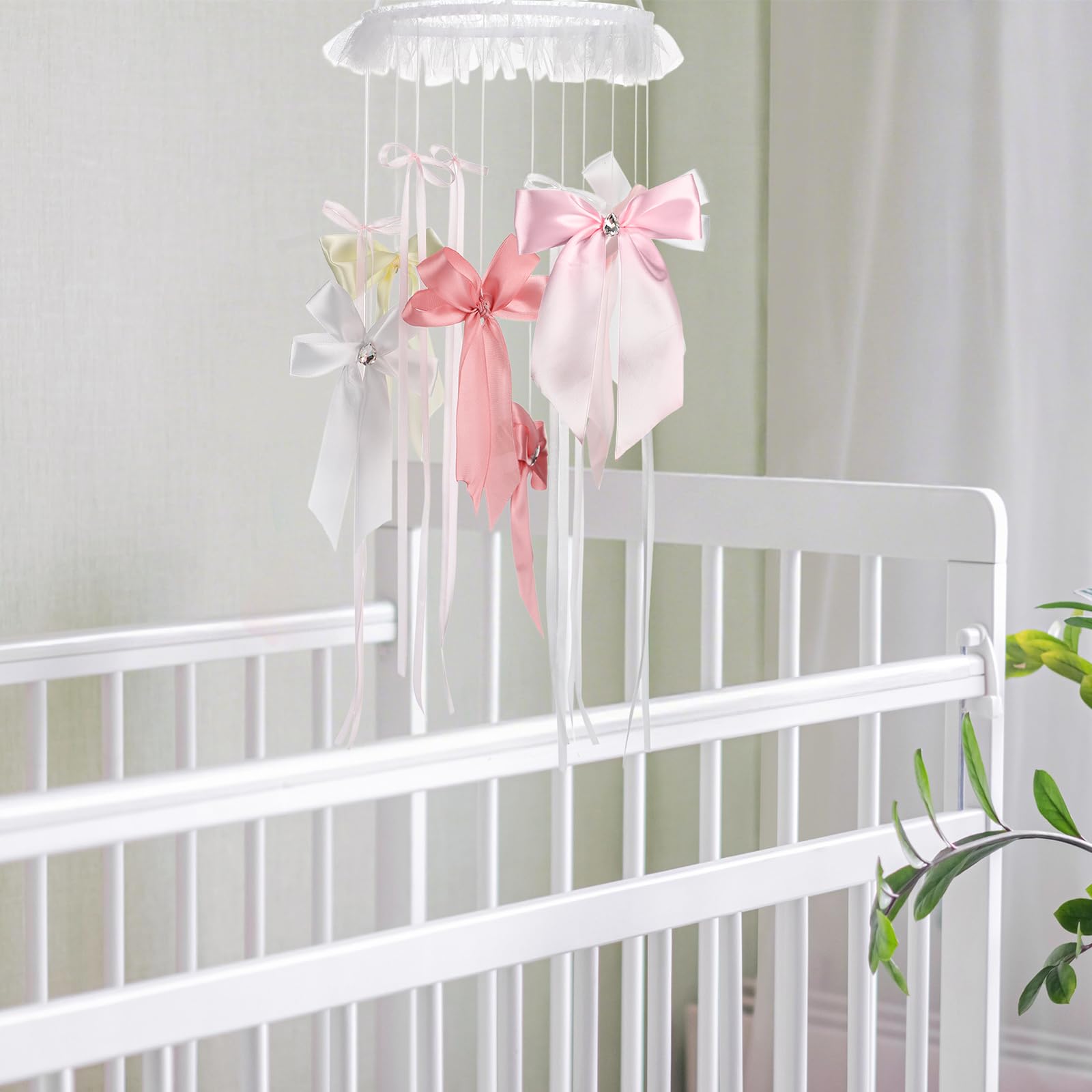 Wenqik 3D nursery gift mobile adds elegant decor.