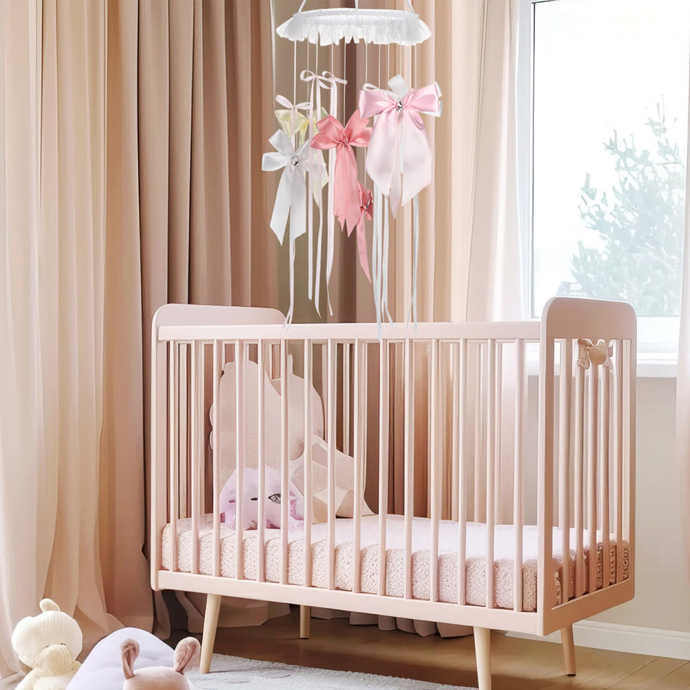 Wenqik simple installation crib mobile hangs easily from a bracket.