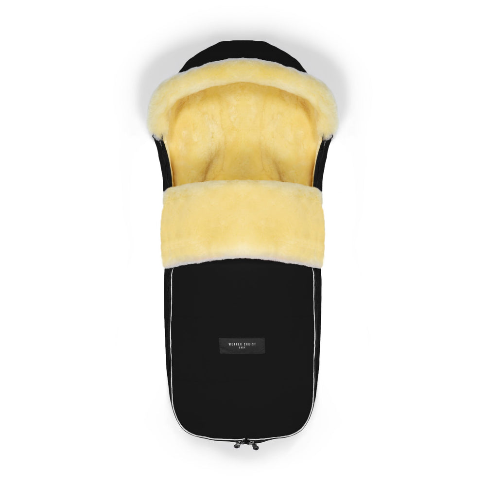 Werner Christ LADIS footmuff with hood for travel buggies keeps little riders warm.