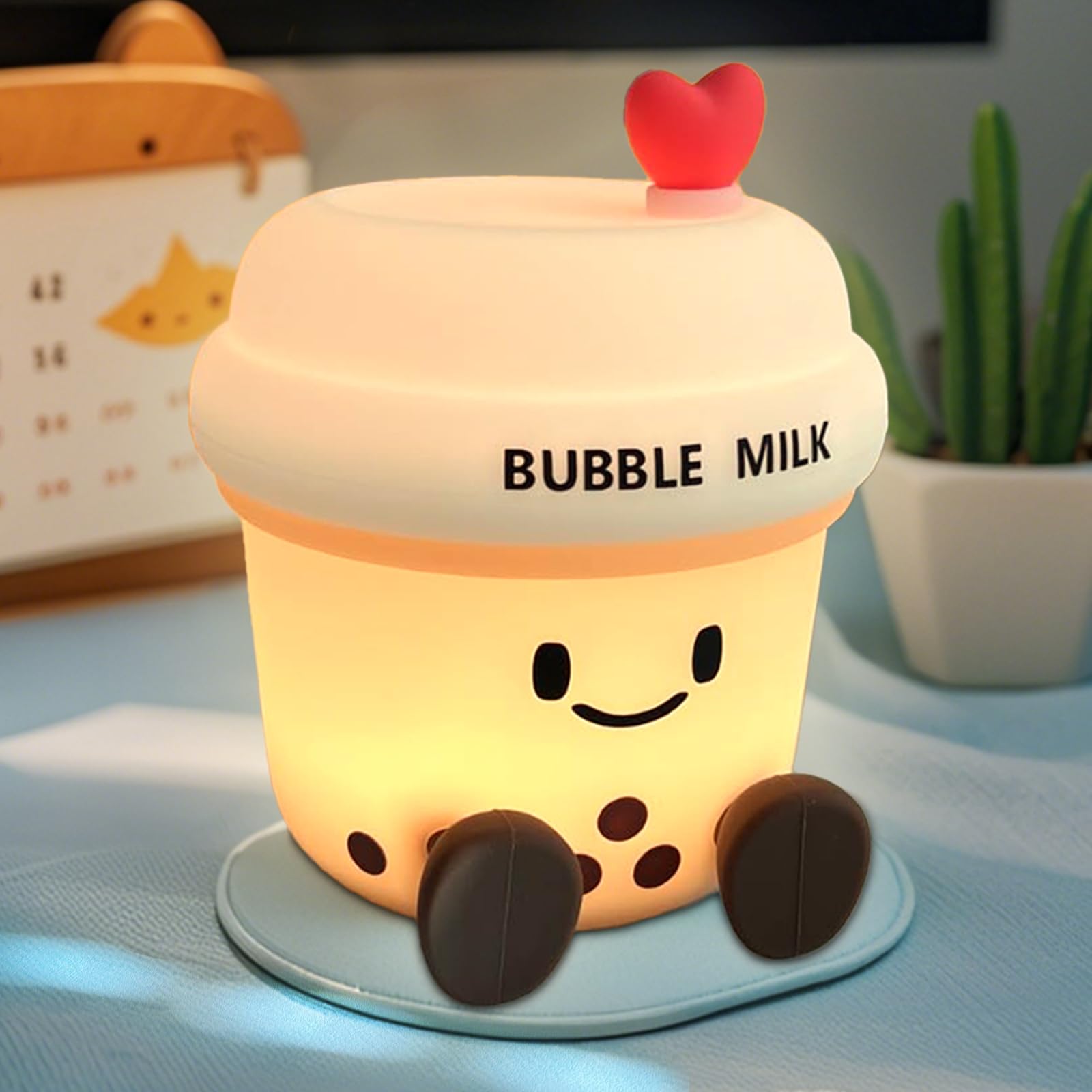 WesData bubble milk cup night light glows softly at the bedside for bedtime routines