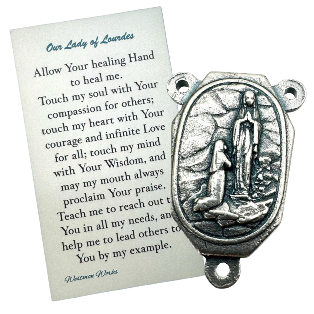 Westmon Works metal centerpiece detail, raised Our Lady image enhances custom rosaries for personal devotion.