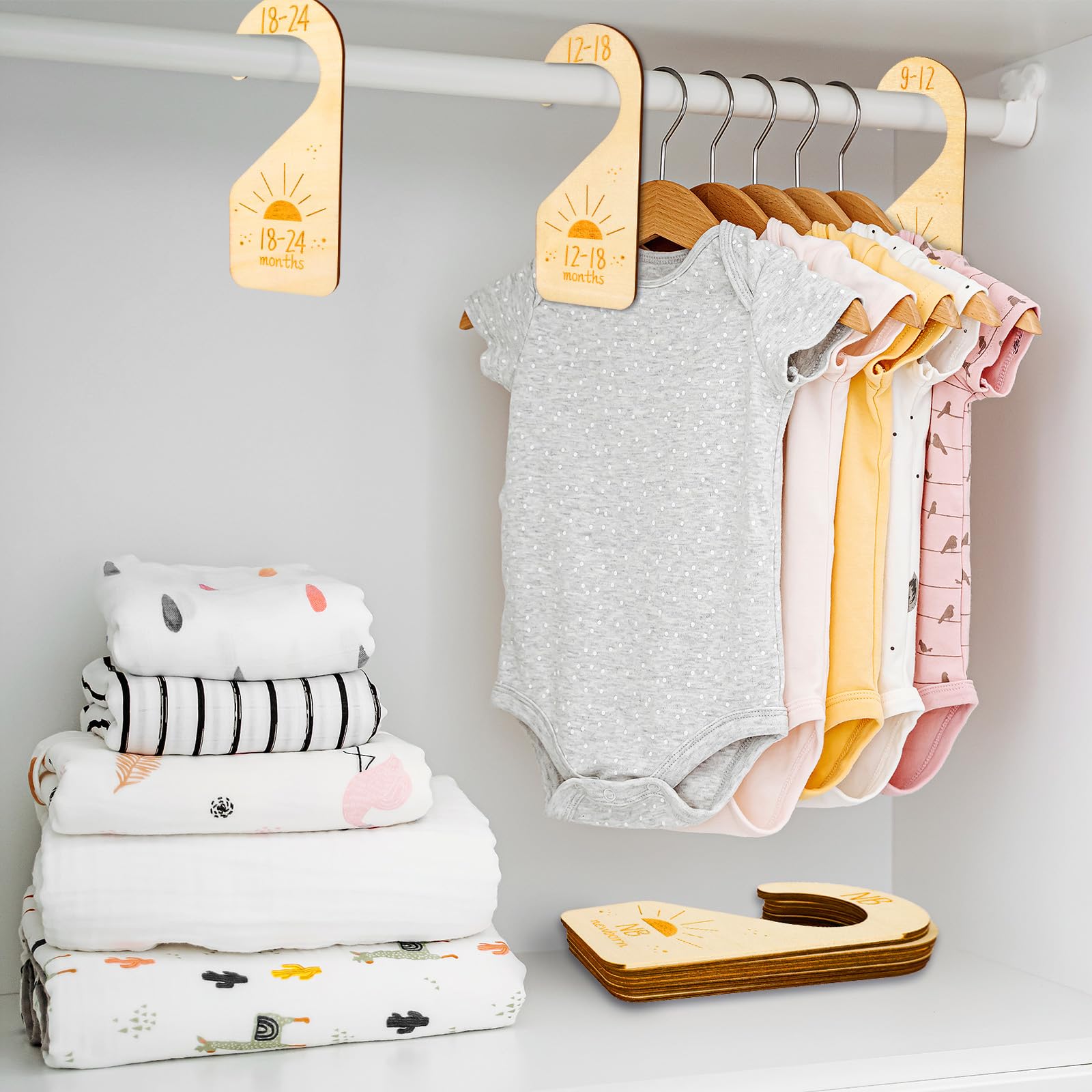 Whaline neutral design complements any nursery while organizing clothes