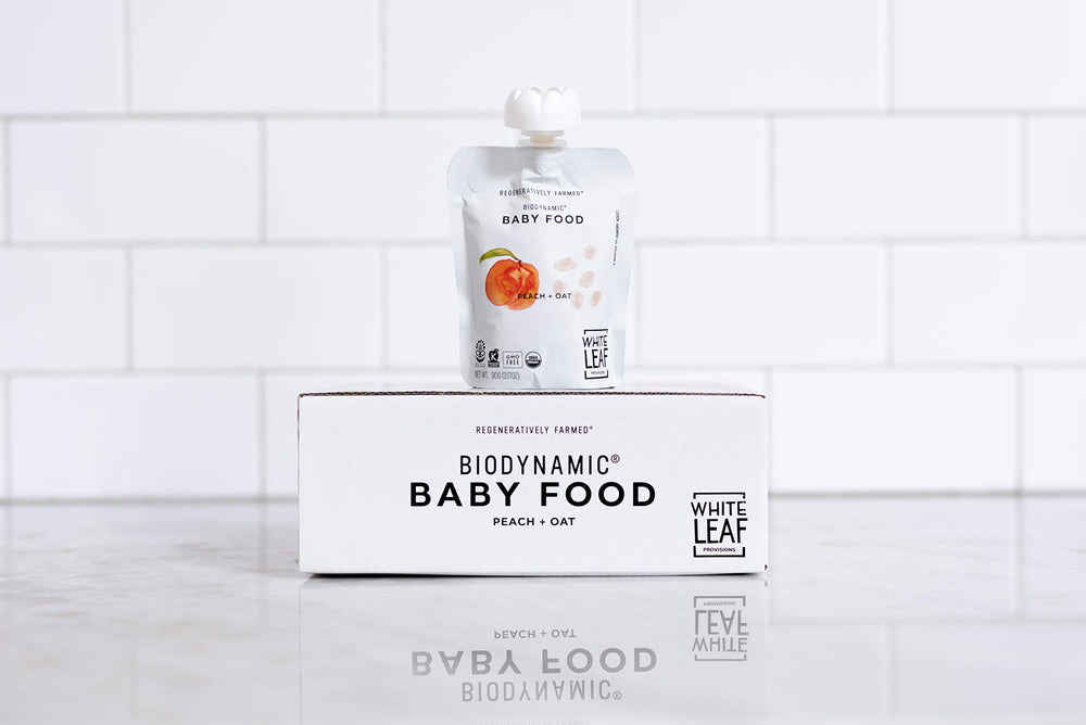 On-the-go White Leaf Provisions peach and oat puree pouch for little hands