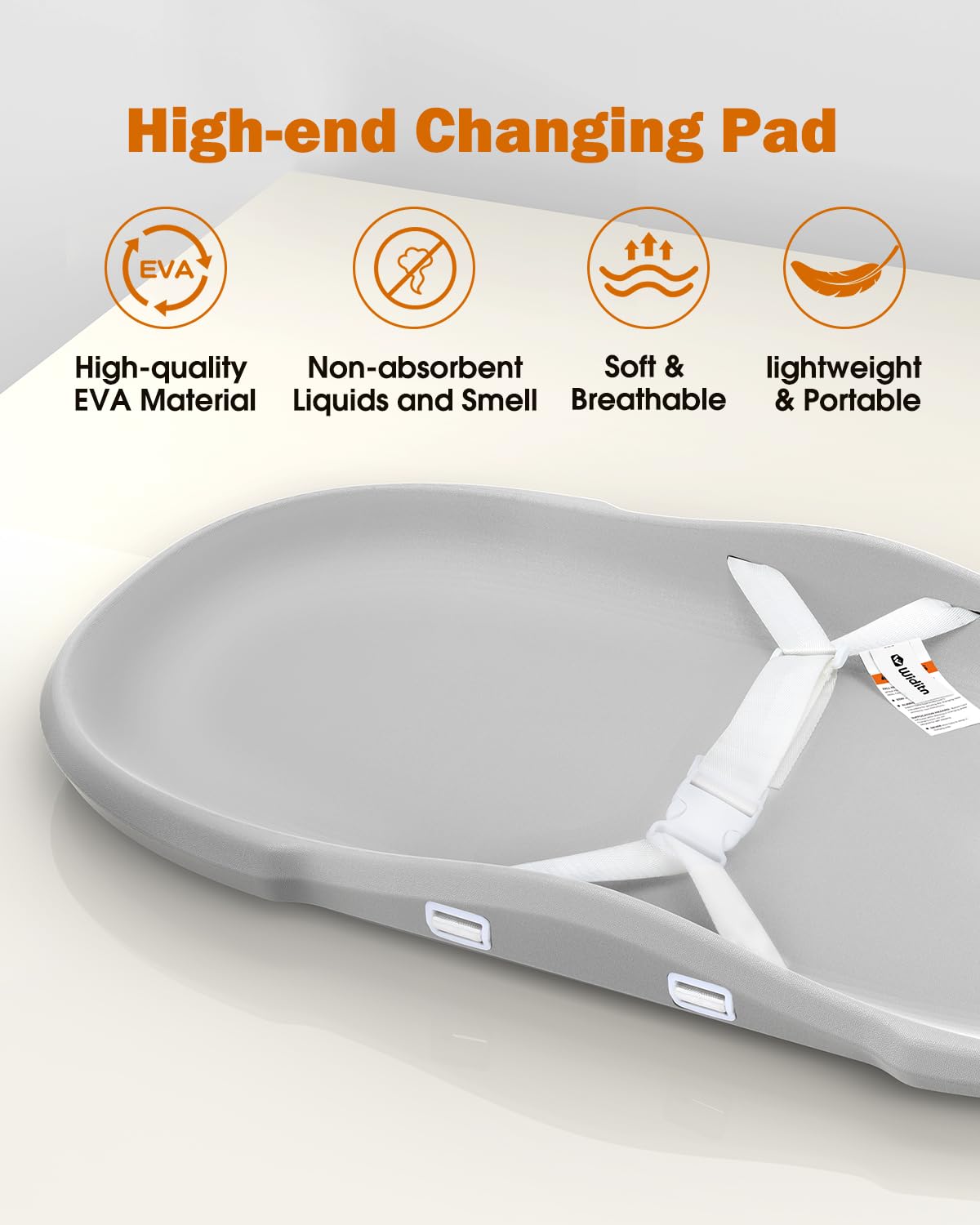 Widitn changing pad shown on a tidy nursery dresser