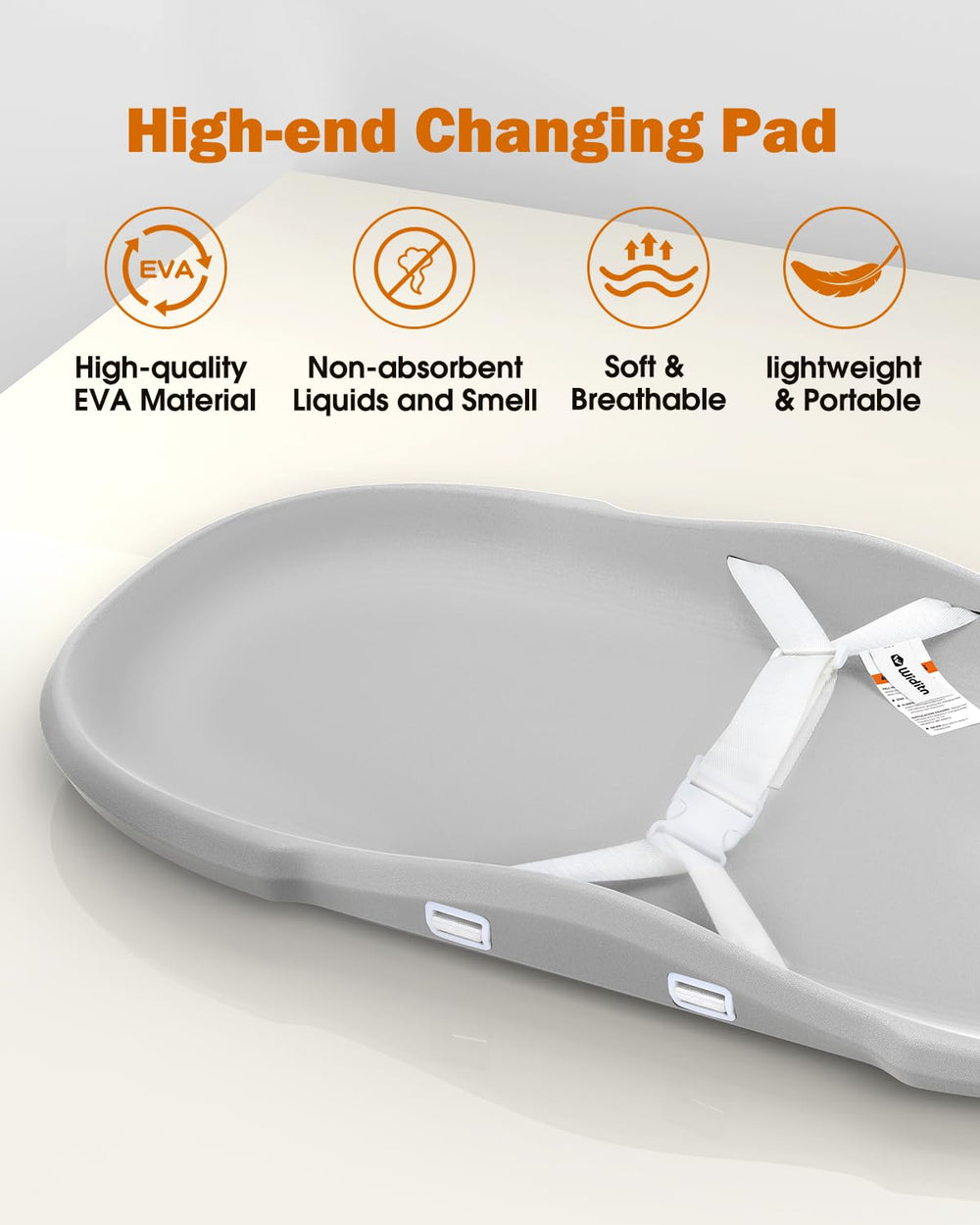 Widitn changing pad shown on a tidy nursery dresser