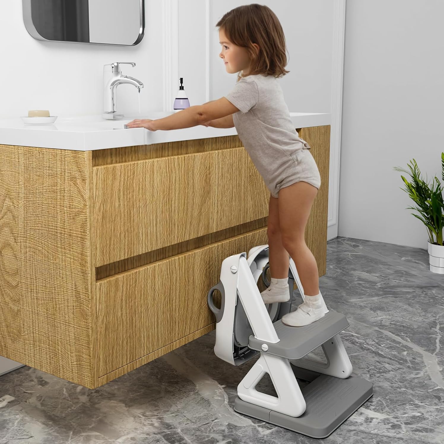 Wiifo adjustable height ladder fits standard toilets for growing children.