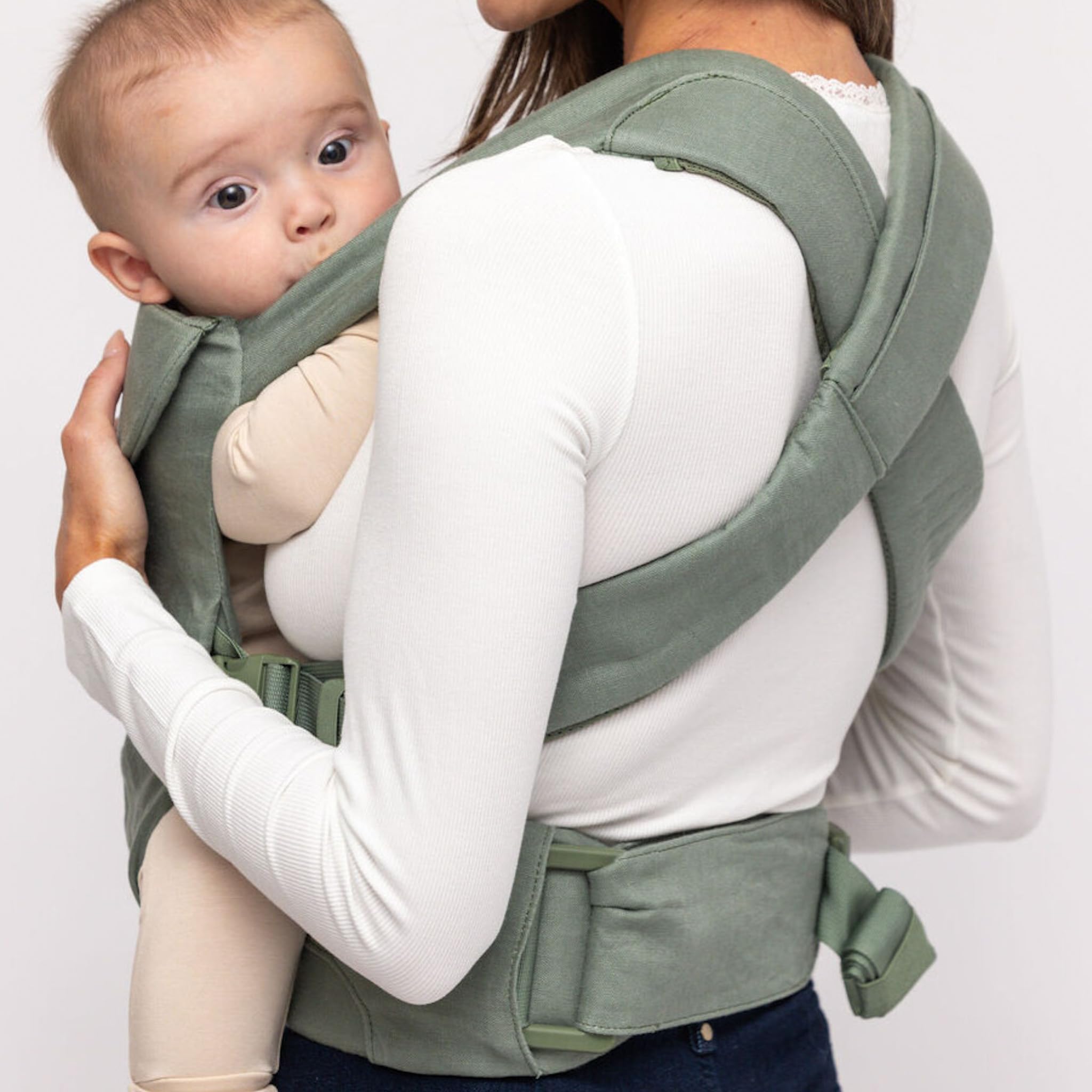 WildBird Aerial Buckle Carrier headrest and adjustable fit for growing babies.