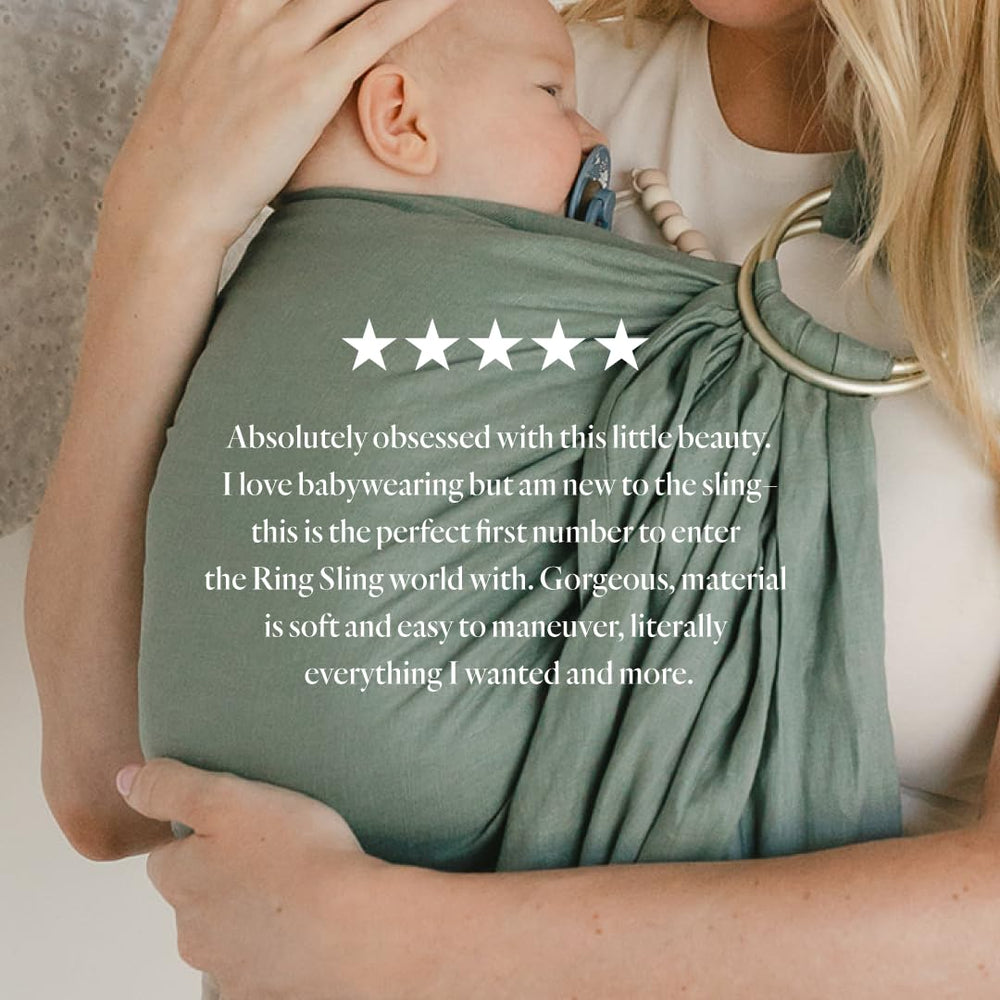WildBird Ring Sling baby in carrier front carry demonstrates upright, comfortable positioning.
