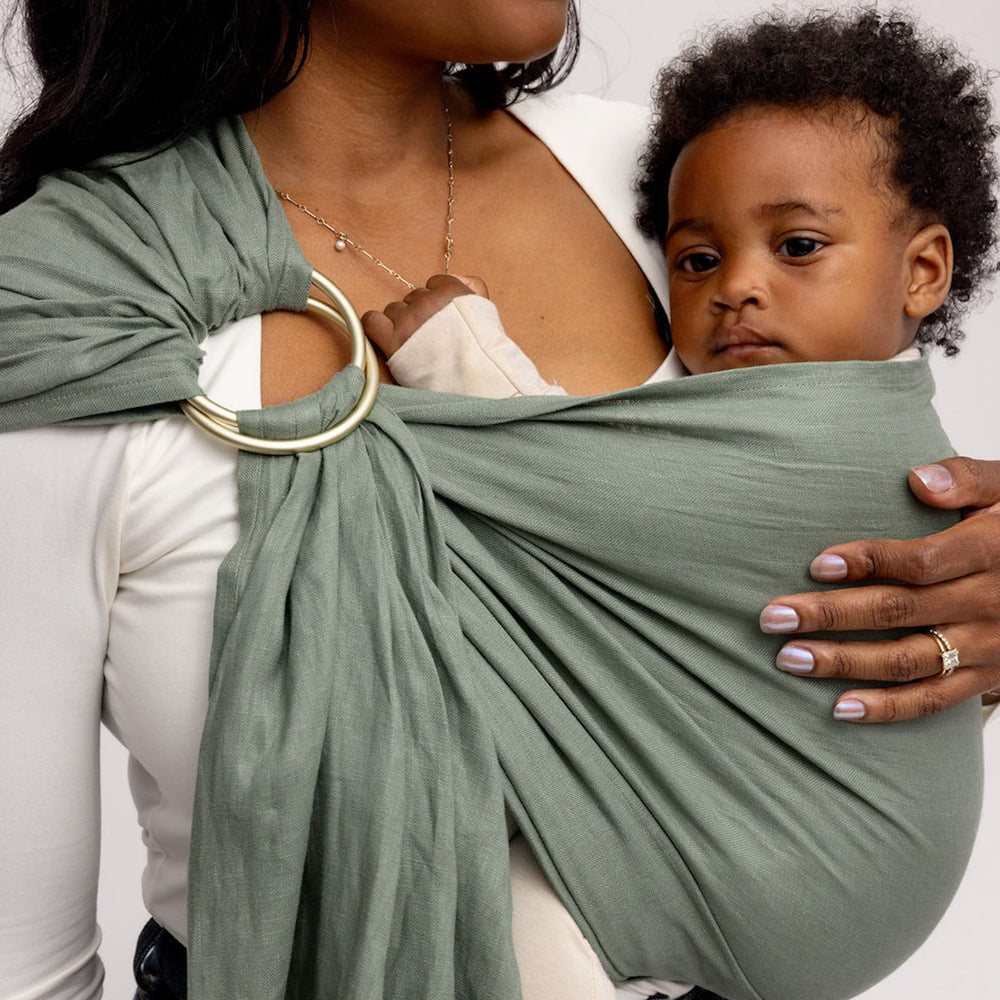 WildBird Ring Sling sunshade nursing cover illustrates versatile, multi-use design.