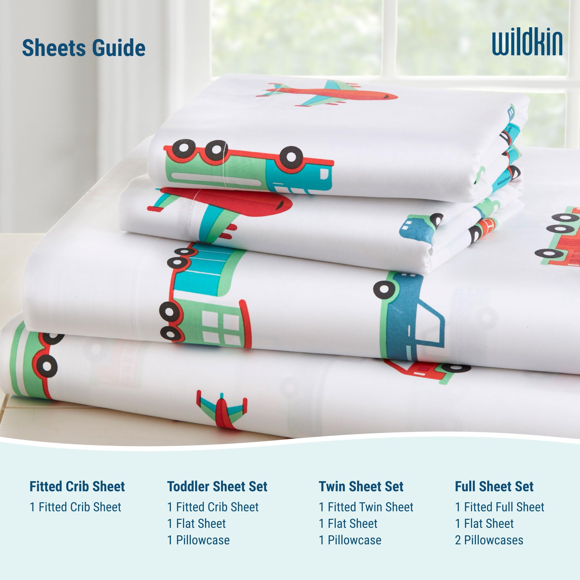 Wildkin coordinating bedding with Shark Attack print in a nursery