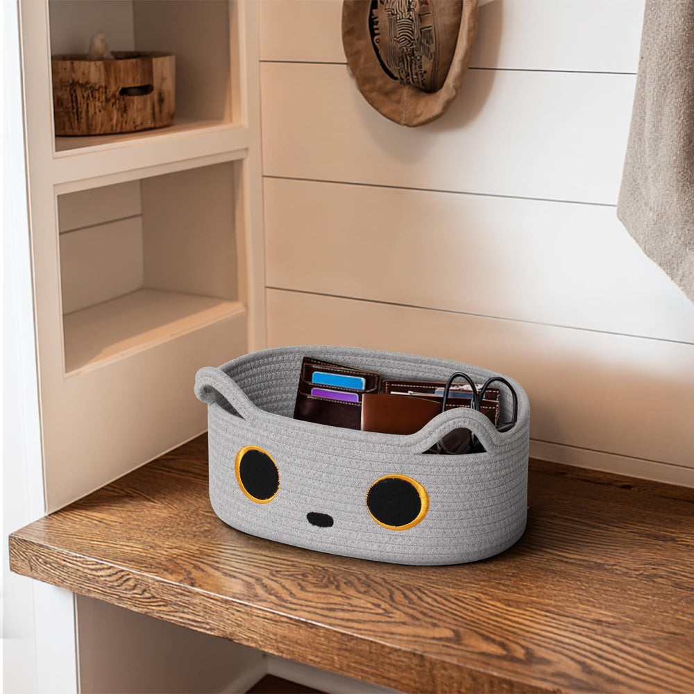 Willitat gray cat toy basket sits neatly on a shelf or table.