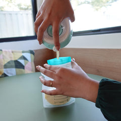 Willow milk transfer using the pour spout to bottle.