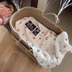 Wimist Flower-B swaddle used as nursing cover for discreet feeding