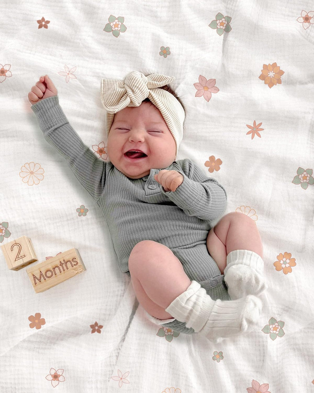 Wimist Flower-B swaddle with Morandi hues adding modern nursery style