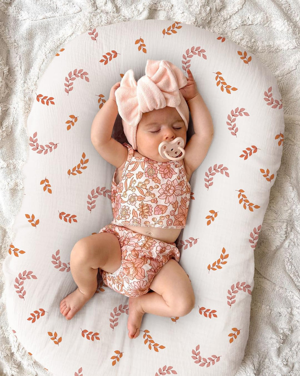 Wimist envelope-closure design protects baby from zipper contact.