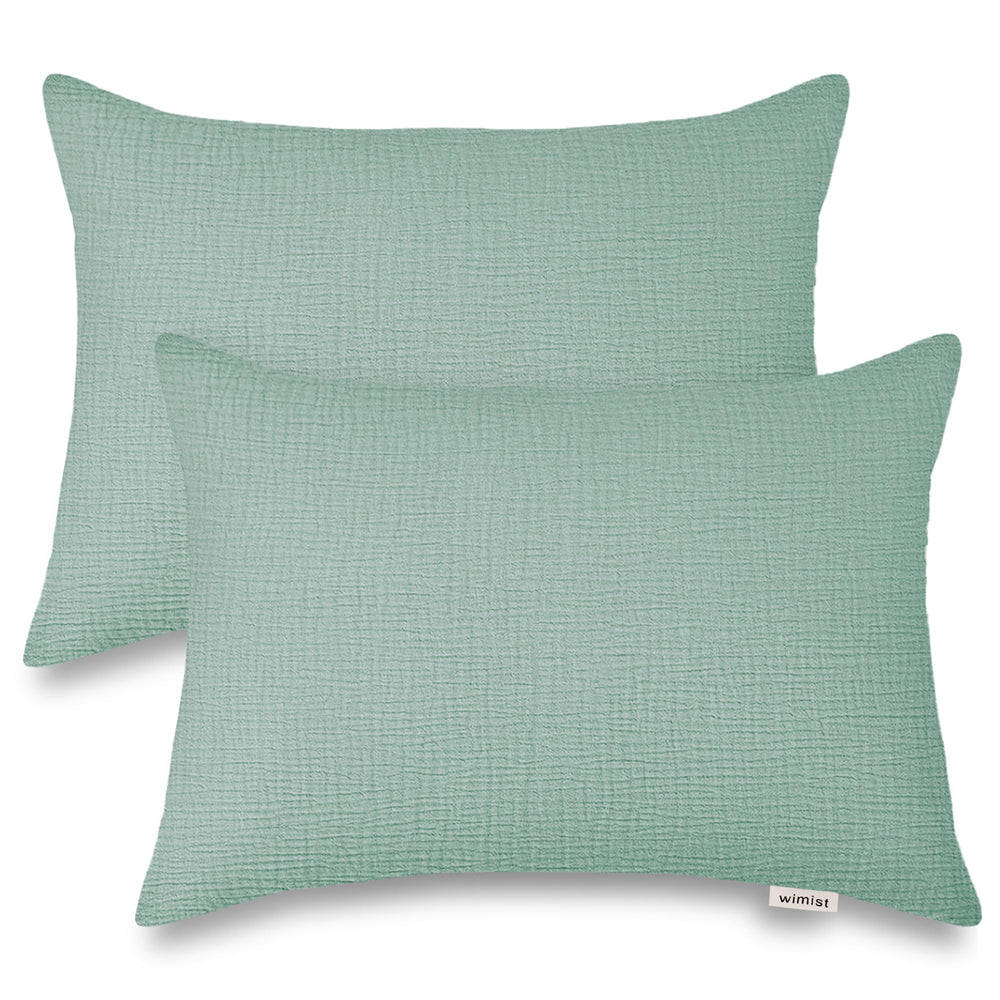 Wimist toddler pillowcase in sage with envelope closure keeps pillow secure.
