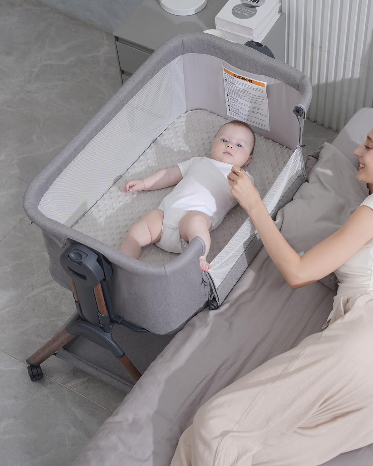 Winchild ASTM-CPSC certified bassinet ensures safety-focused design.
