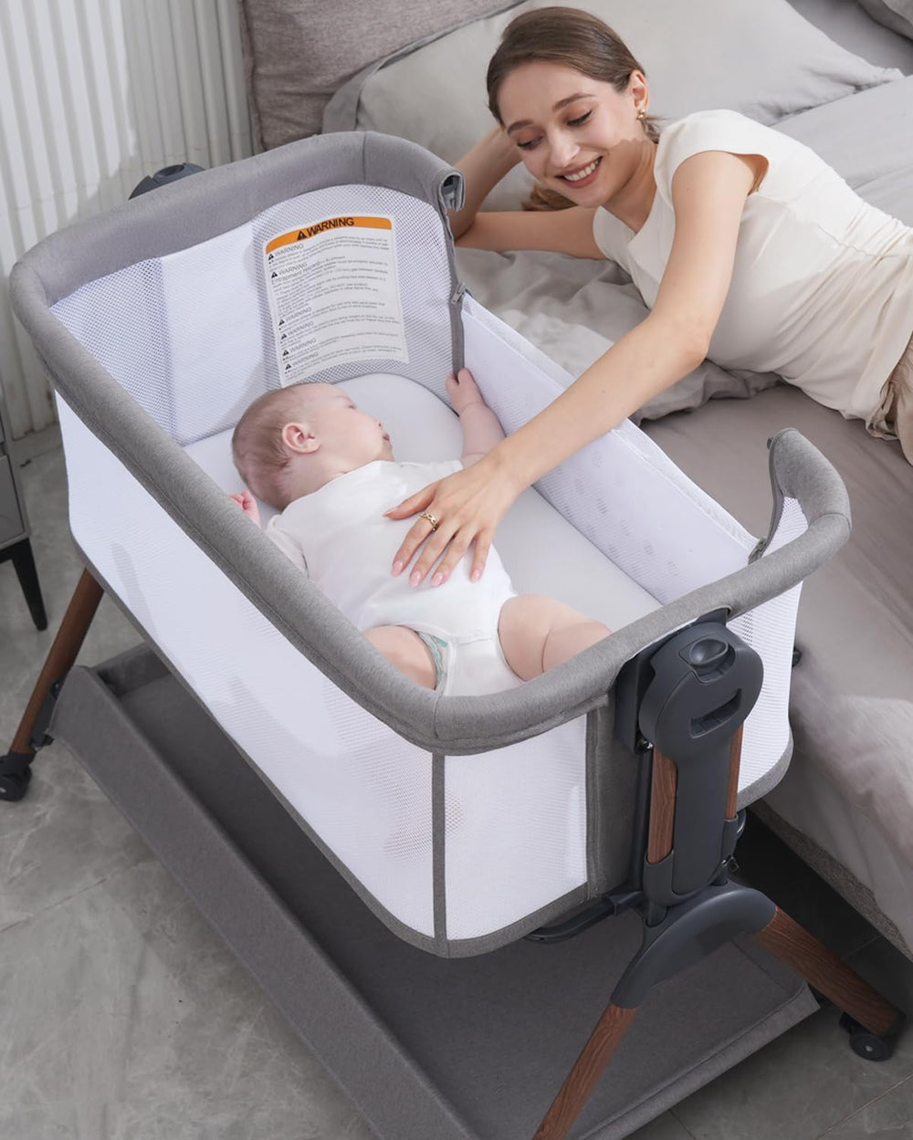 Winchild bassinet side mesh walls provide visibility and airflow for baby