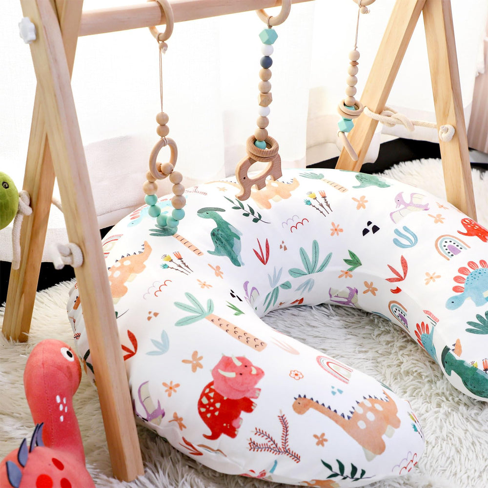WINGHENLEE Dinosaur nursing cover adds a cheerful nursery touch that's easy to swap.