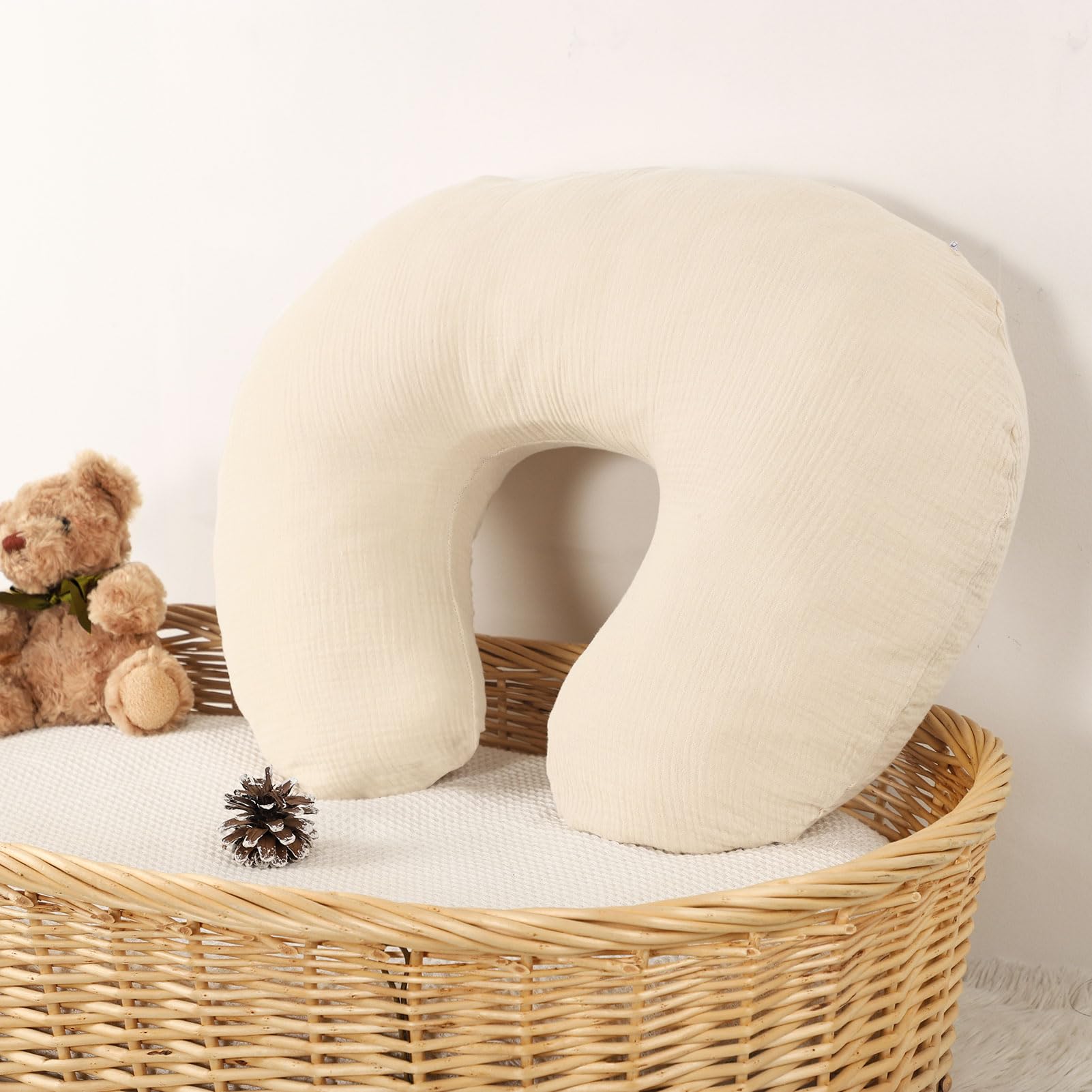 Winghenlee muslin nursing pillow cover in nursery setting emphasizes tidy bedding.