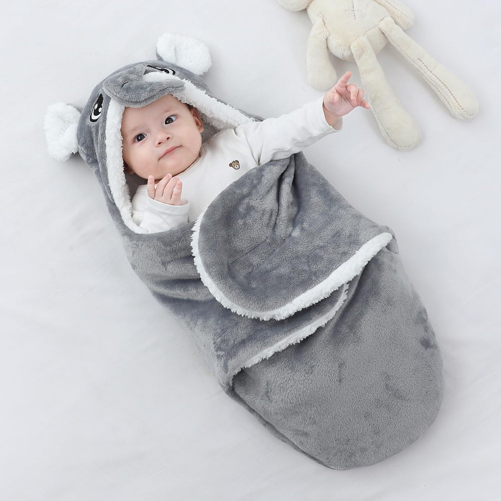 Winmany blue bear swaddle; secure wrap with playful character.