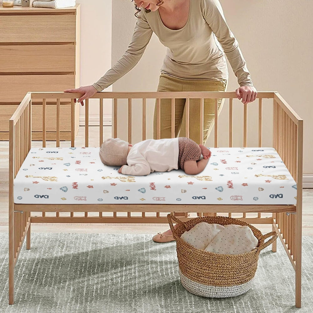 Winpema giraffe print crib sheet fits standard cribs securely.