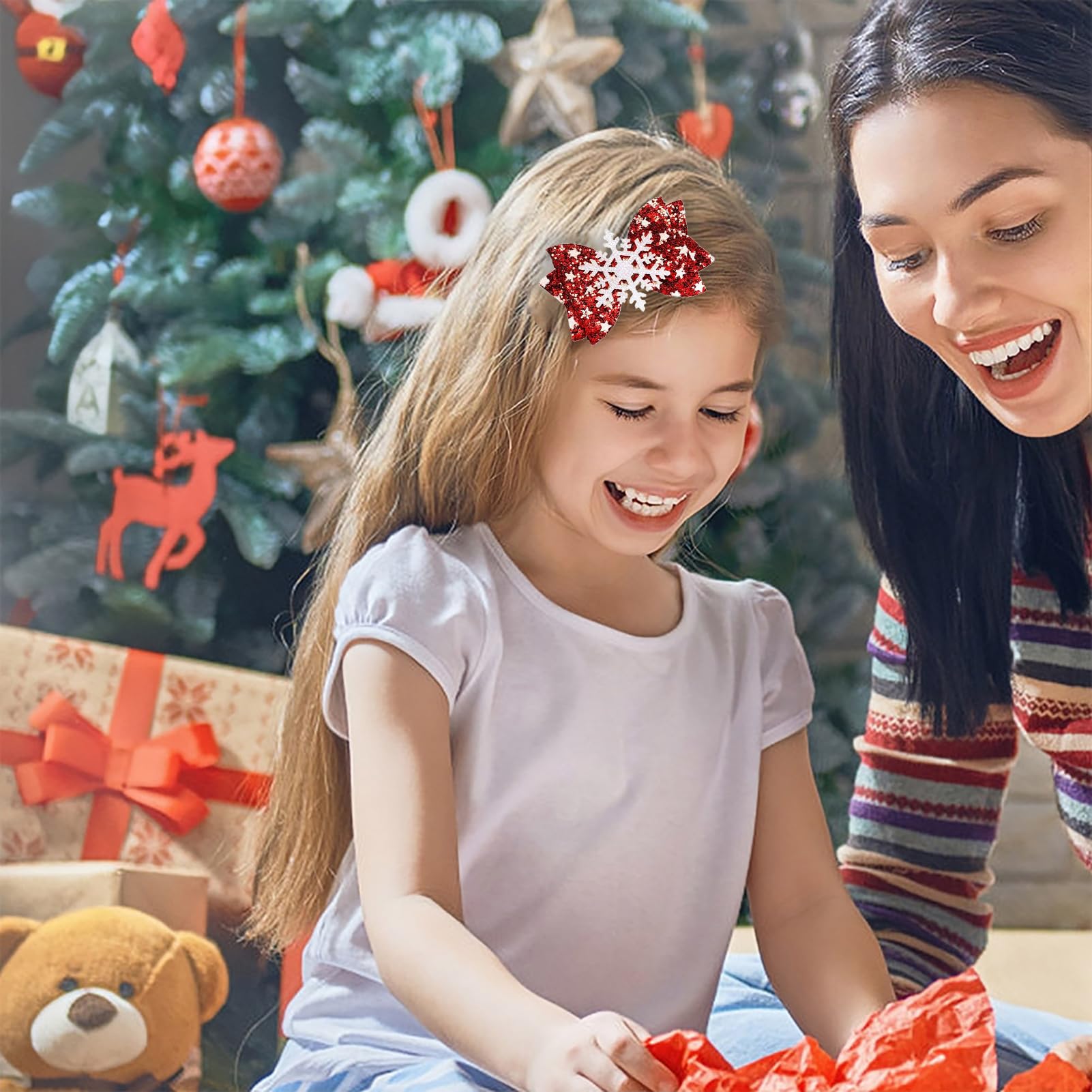 Winthrop snowflake glitter bow hairclip adds sparkle to holiday looks.