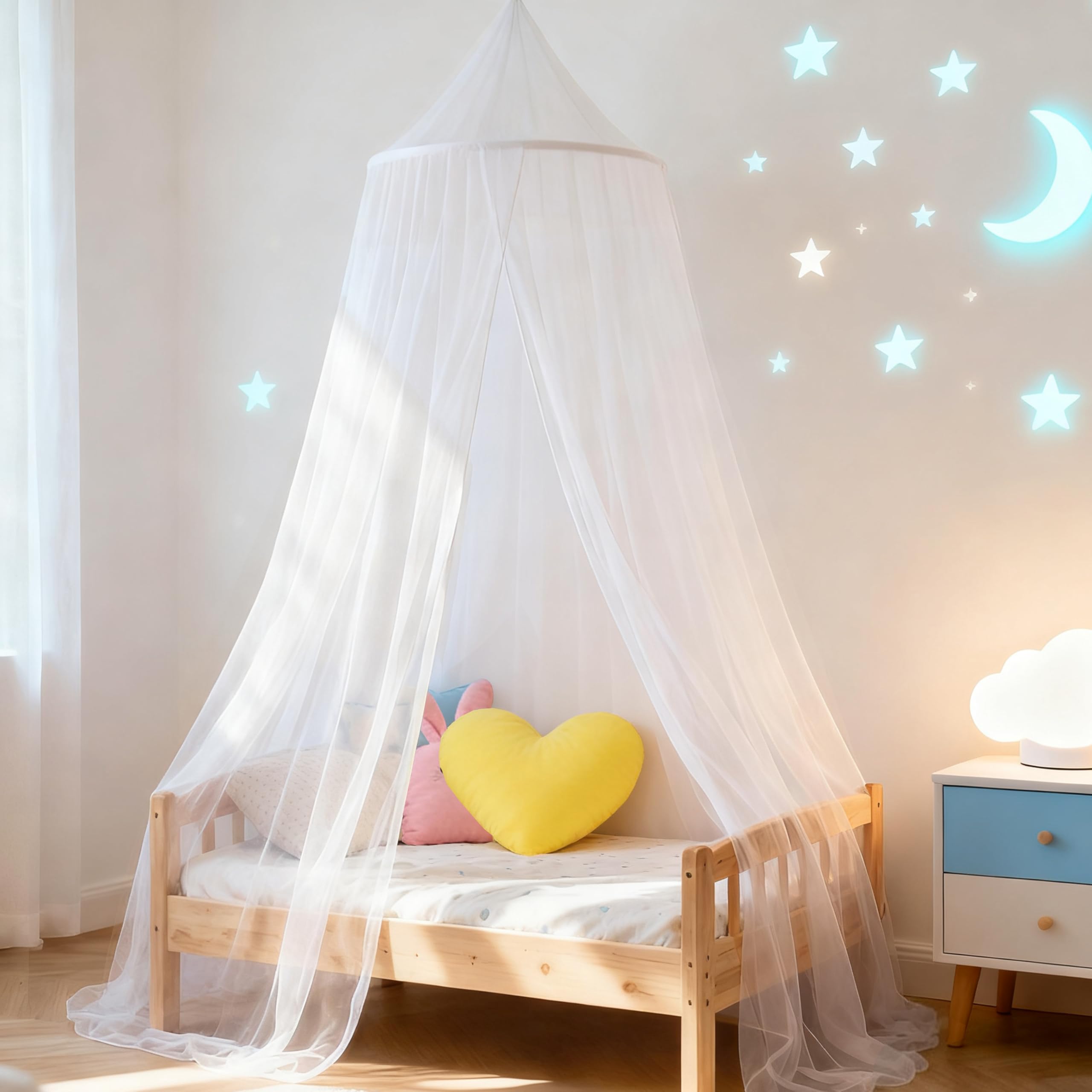 Wnqou white bed canopy draped over a bed to create a cozy sleep nook.