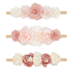 WNYUJOY baby flower headbands with soft nylon band and bright petals, ideal for newborn photos.