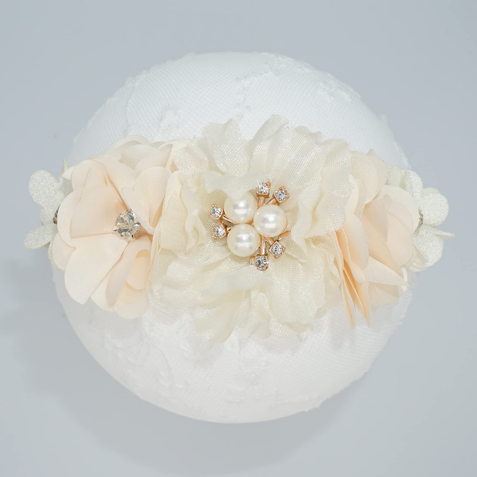 WNYUJOY baby wearing flower headband for photography and everyday outfits.