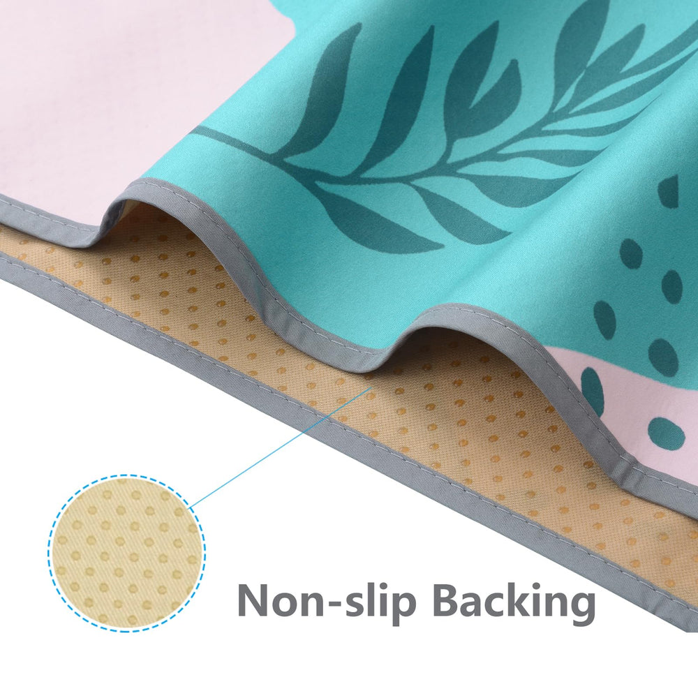 WOMUMON Splat Mat anti-slip backing stays in place on floors.