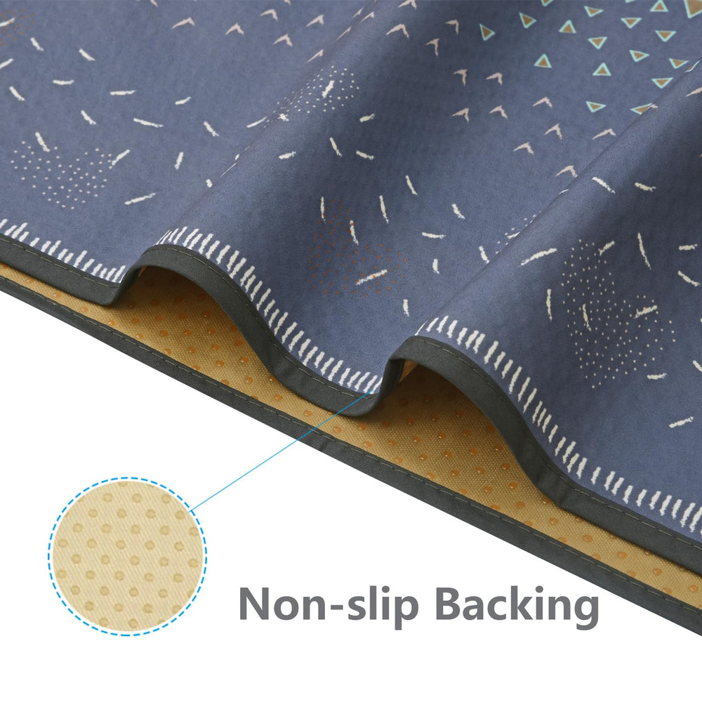 WOMUMON waterproof mat outdoors for picnics and play sessions.