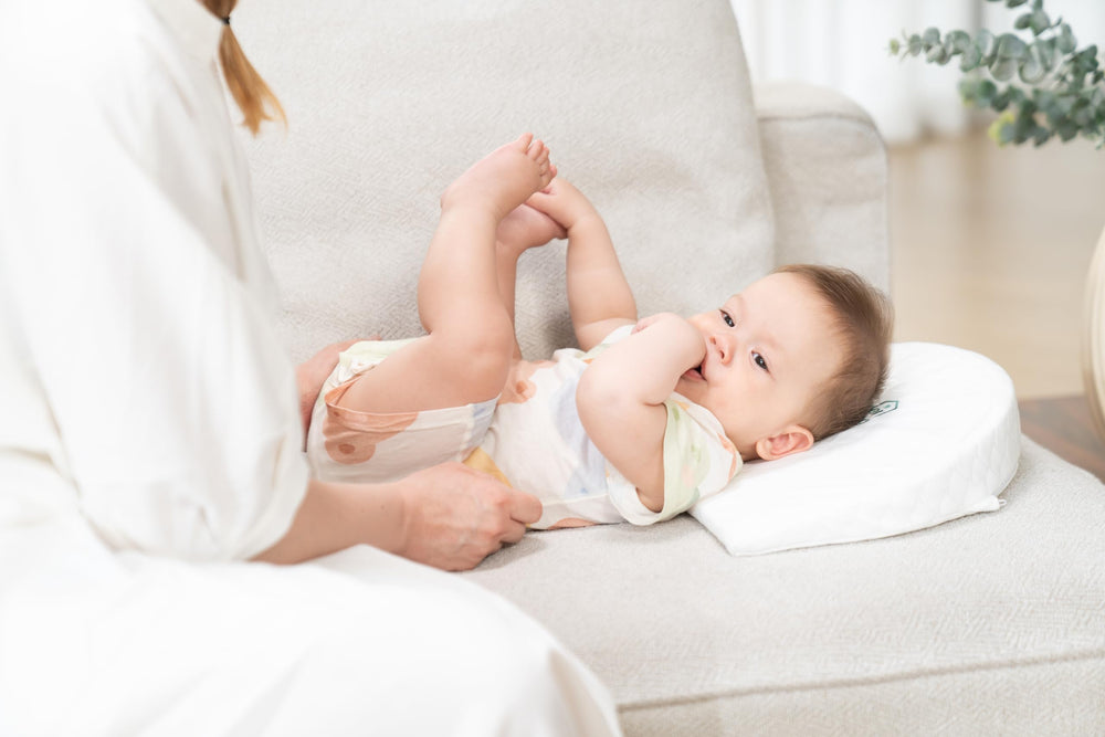 Wonder Living wedge pillow in side view to illustrate compact, portable shape