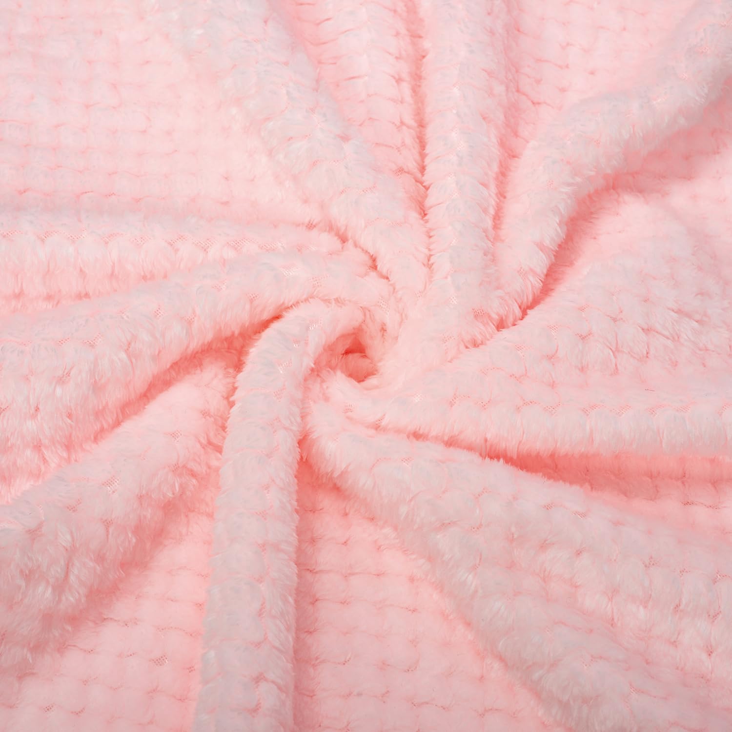 Wonder Miracle all-season blanket displayed in a bright room for adaptable warmth.