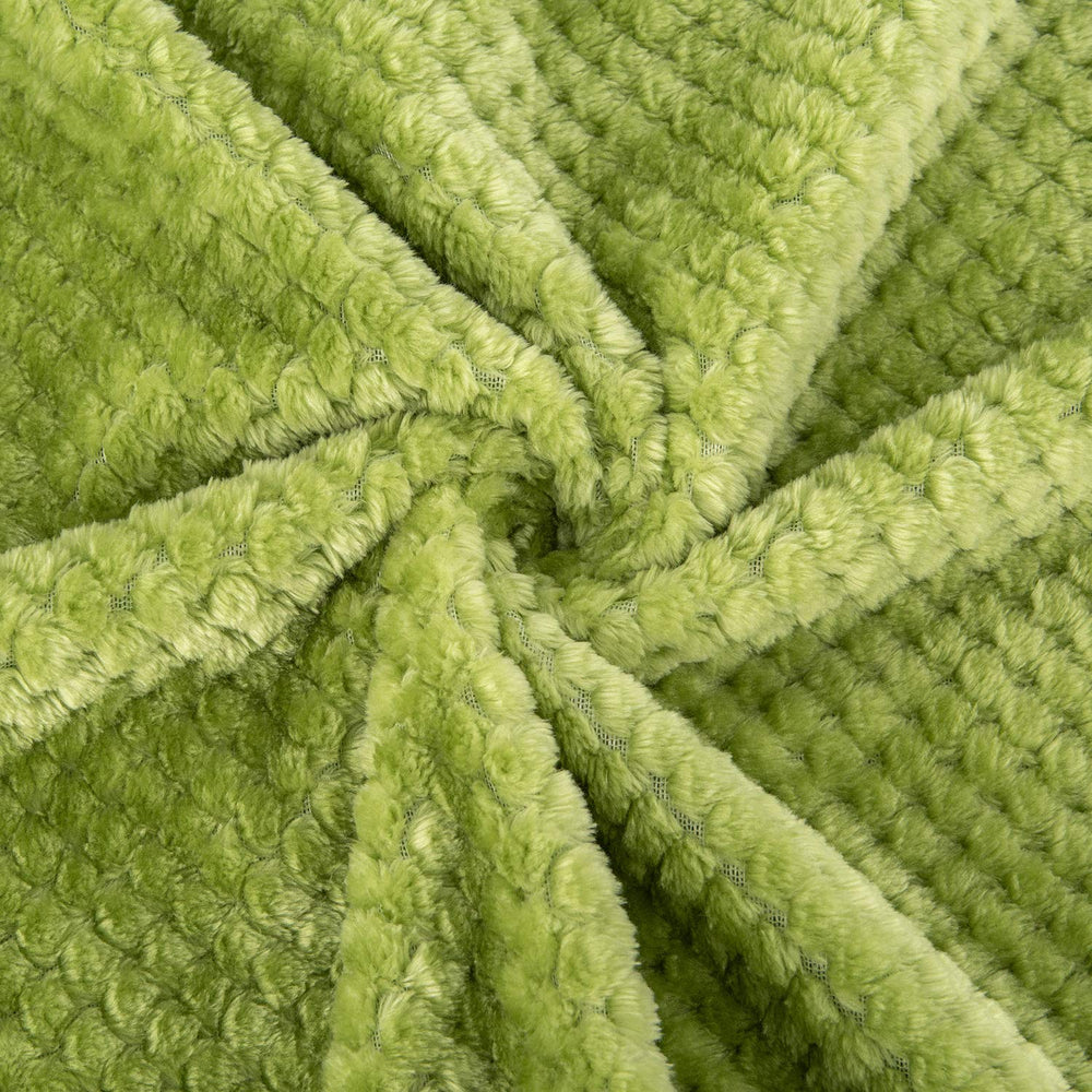 Wonder Miracle baby blanket folded neatly, portable for trips and stroller use.