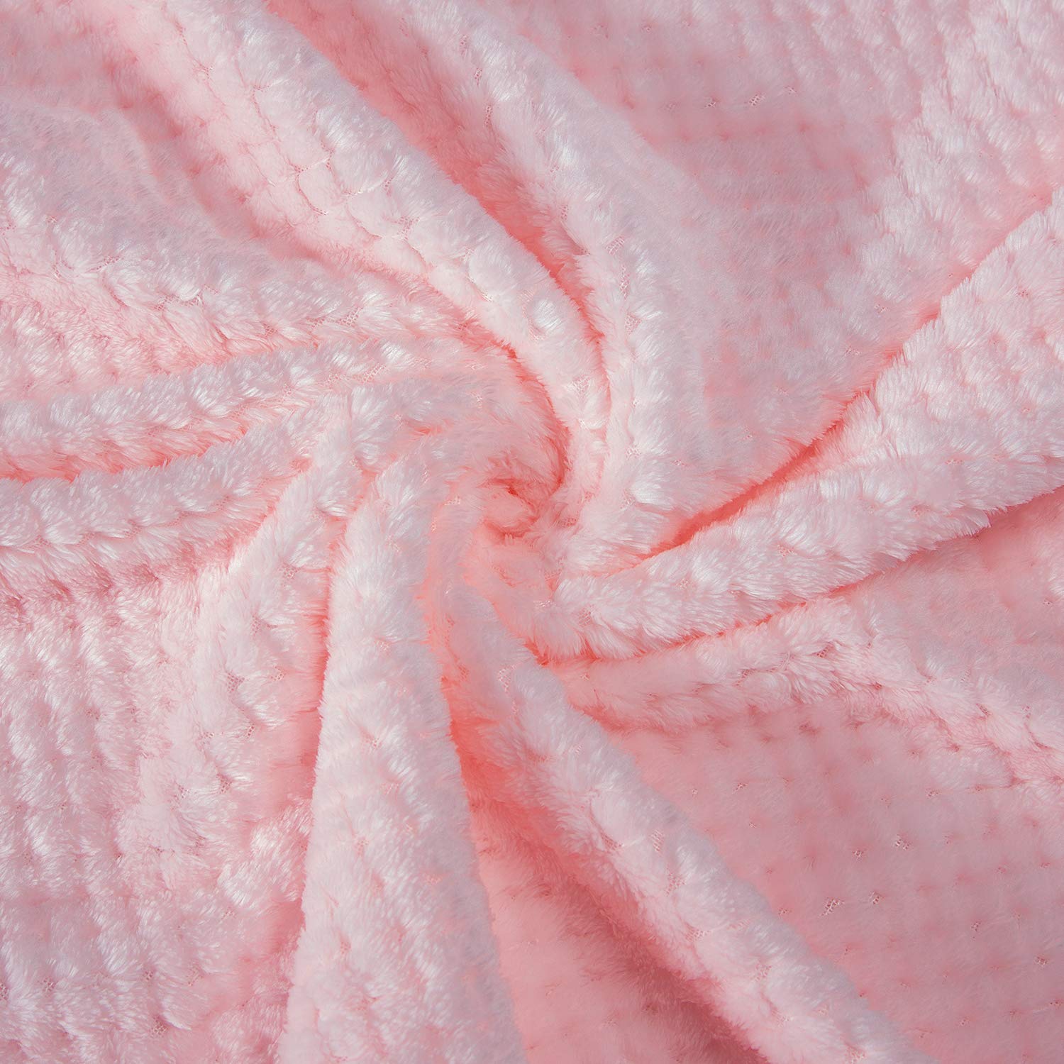 Wonder Miracle baby pink blanket used to swaddle a baby