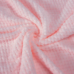 Wonder Miracle baby pink blanket used to swaddle a baby