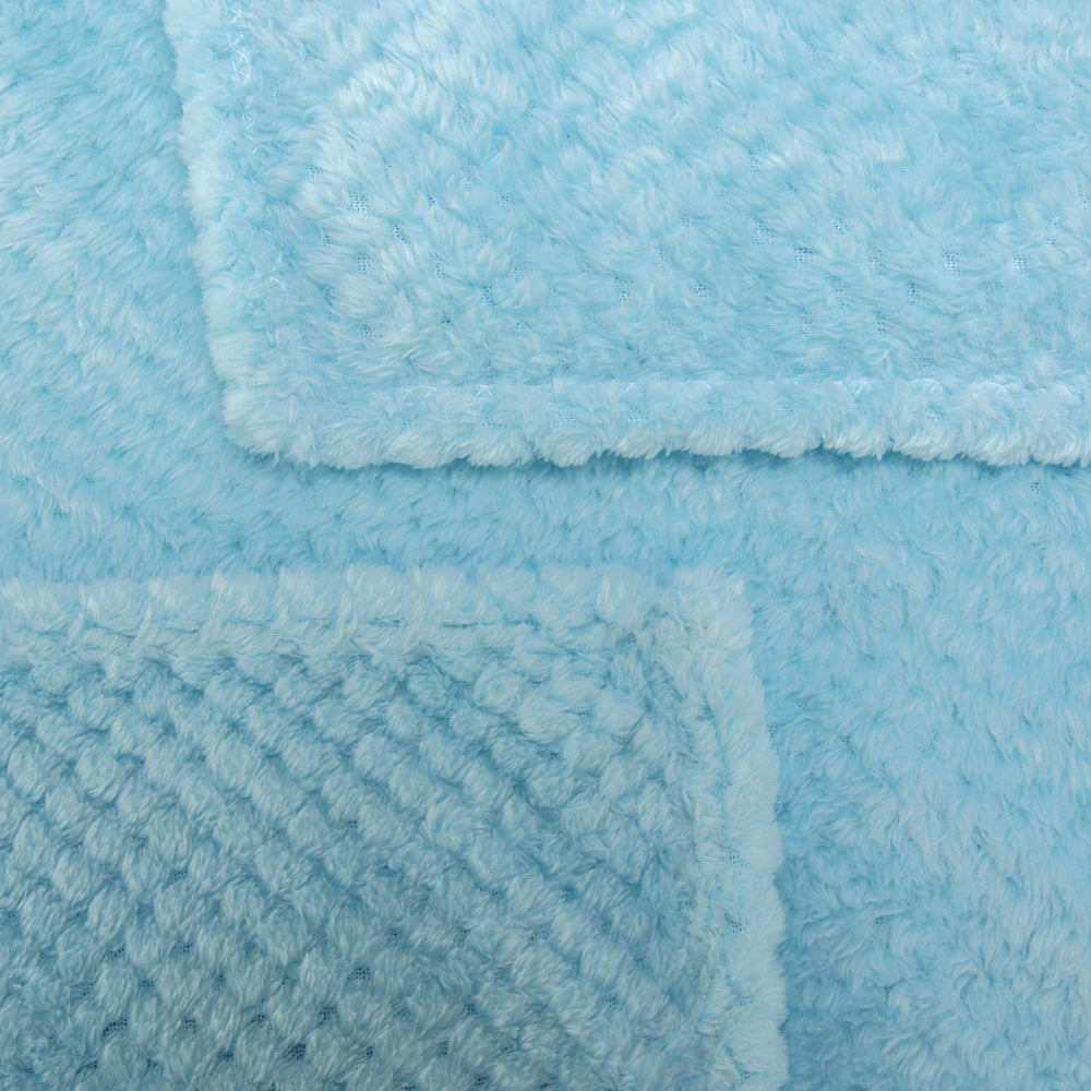 Wonder Miracle bed and couch throw adds versatile warmth to any space.