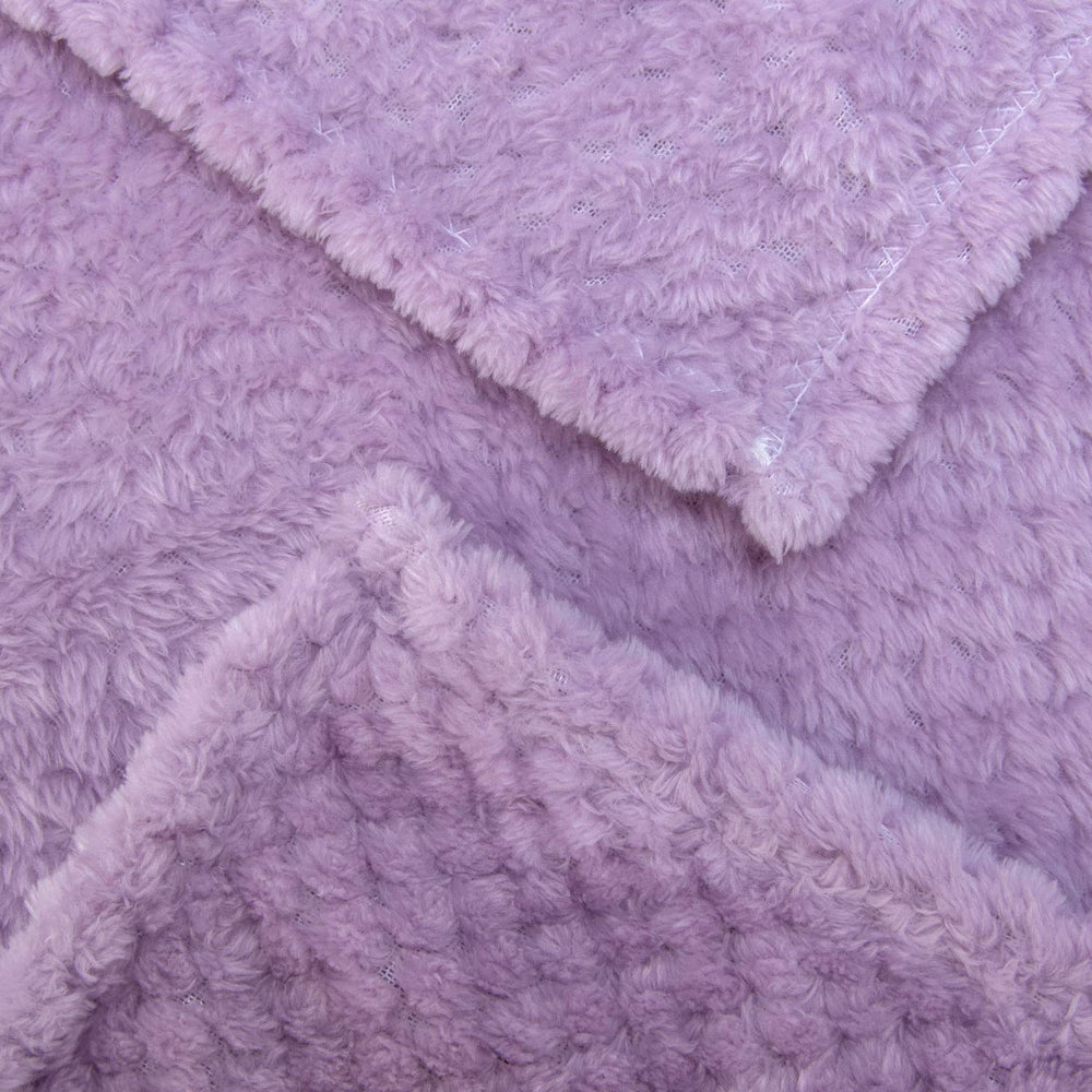 Wonder Miracle lavender blanket offers a gentle layer for bedtime comfort.