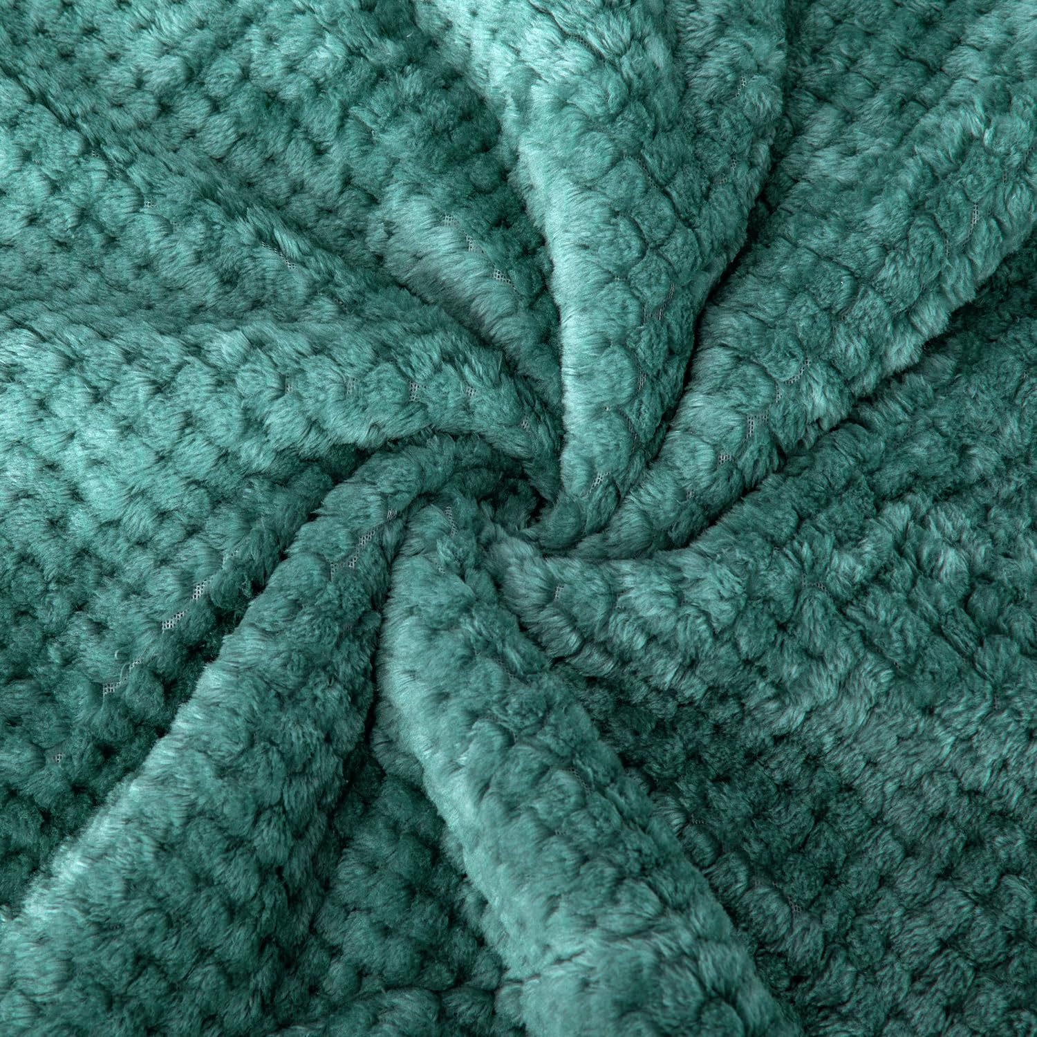 Wonder Miracle blanket in black and green colorway adds stylish warmth