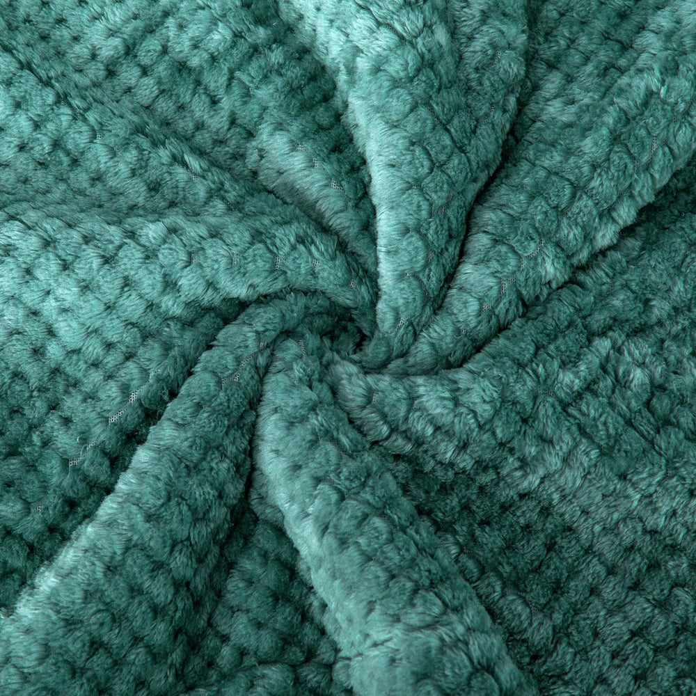 Wonder Miracle blanket in black and green colorway adds stylish warmth