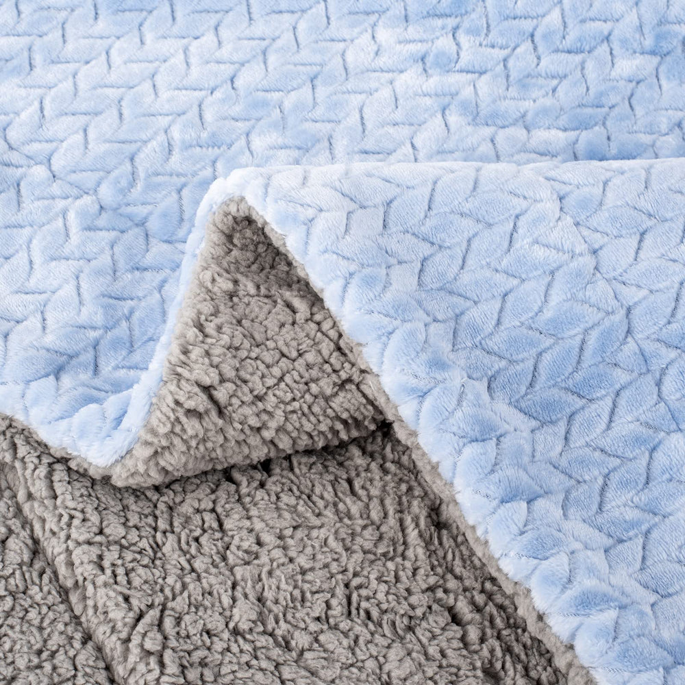 Wonder Miracle blanket as nursery decor accent in sky blue tones.