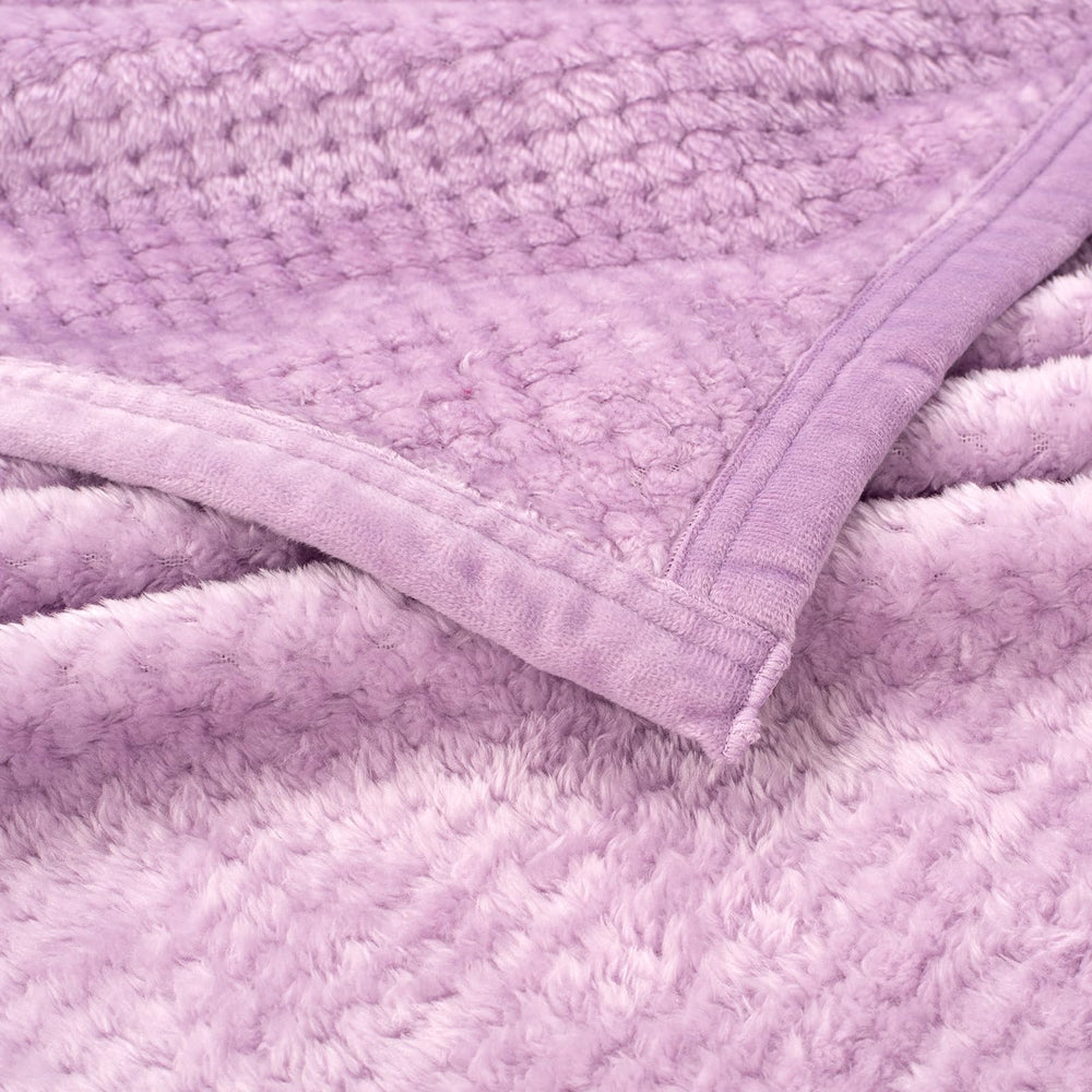 Wonder Miracle blanket shown in swaddle-style versatility for newborn comfort.