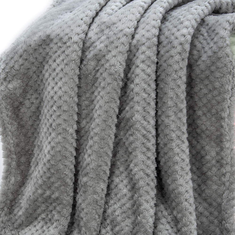 Wonder Miracle couch-throw drape adds cozy ambiance on the sofa.